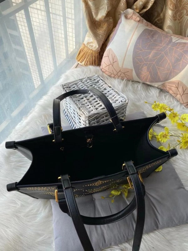 Louis Vuitton On The Go Premium Monogram Empreinte Leather Tote Bag