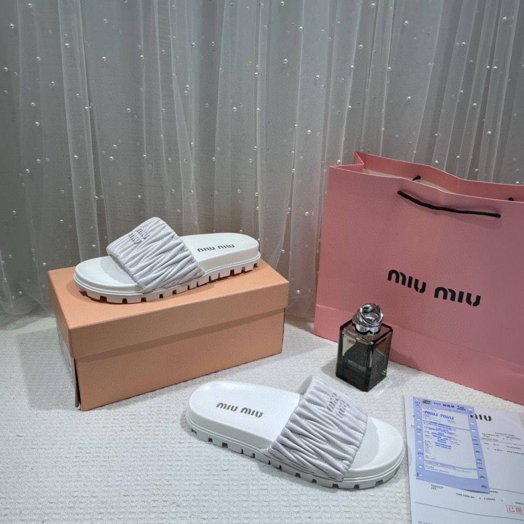 Miu Miu Matelasse Slides For Woman