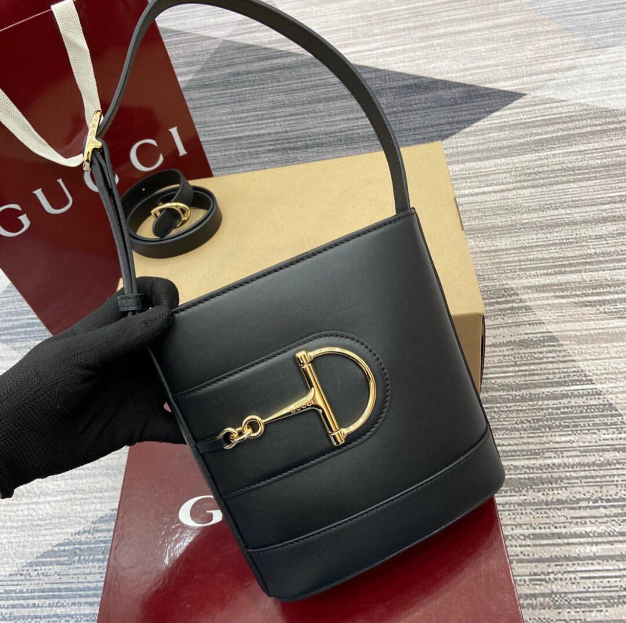 GUCCI 73 BUCKET BAG IN SIGNATURE AND PLAIN