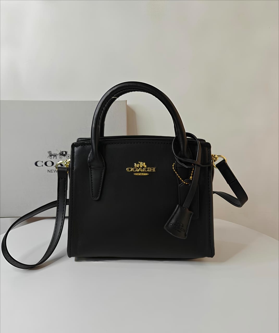 COACH ANDREA CARRYALL