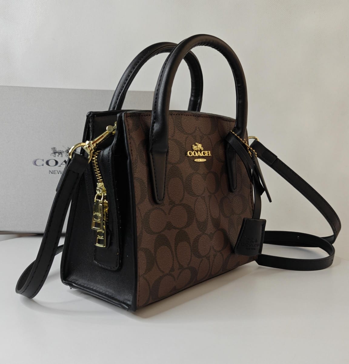 COACH ANDREA CARRYALL