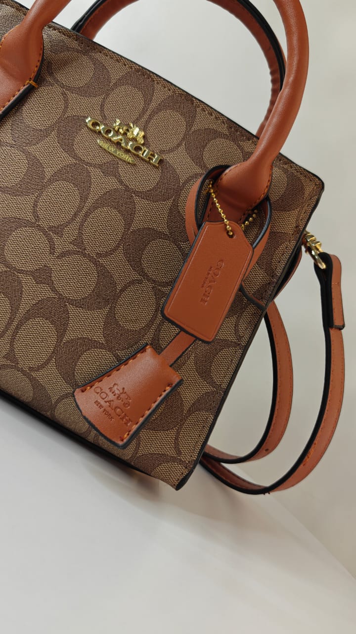 COACH ANDREA CARRYALL