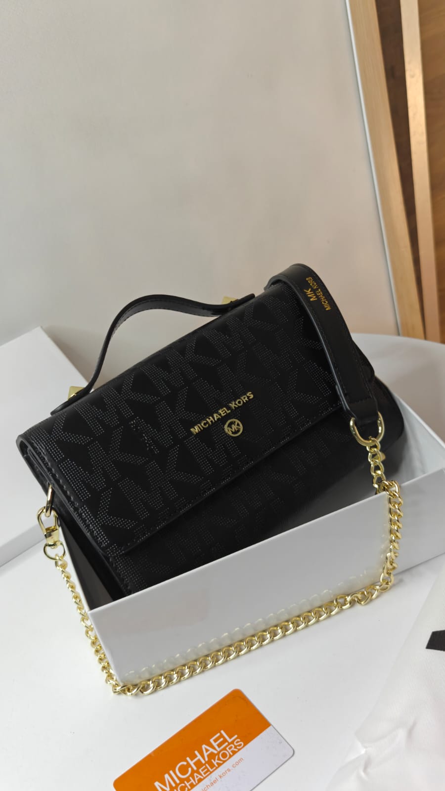 MICHAEL KORS SLING BAGS