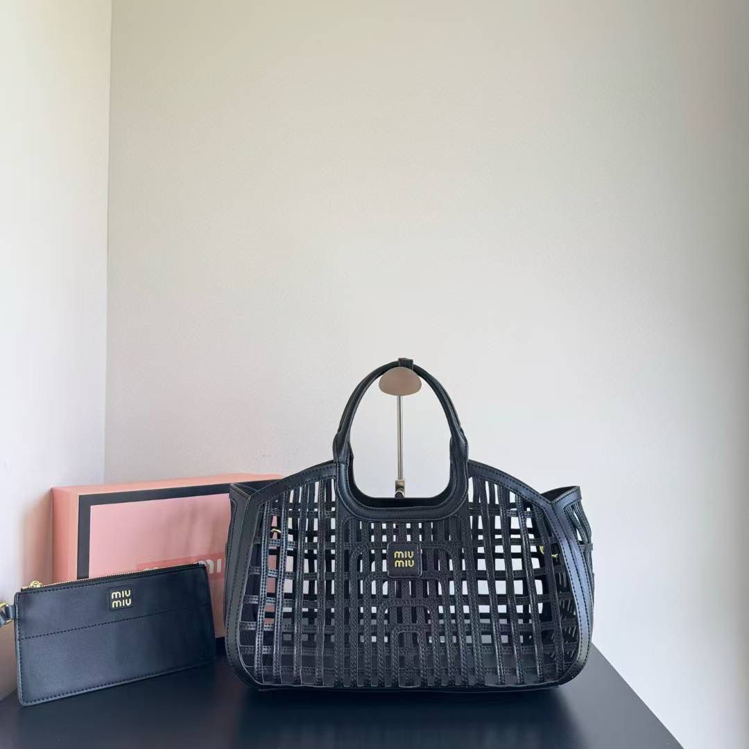 MIU MIU LEATHER TRIMMED LARGE BUCKET BAG WITH UTILITY POUCH