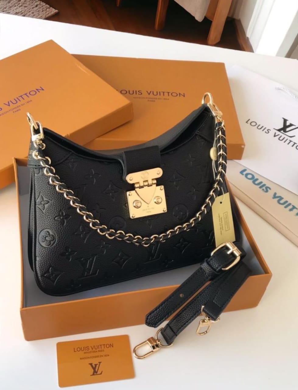 LOUIS VUITTON EMBOSSED TWINNY