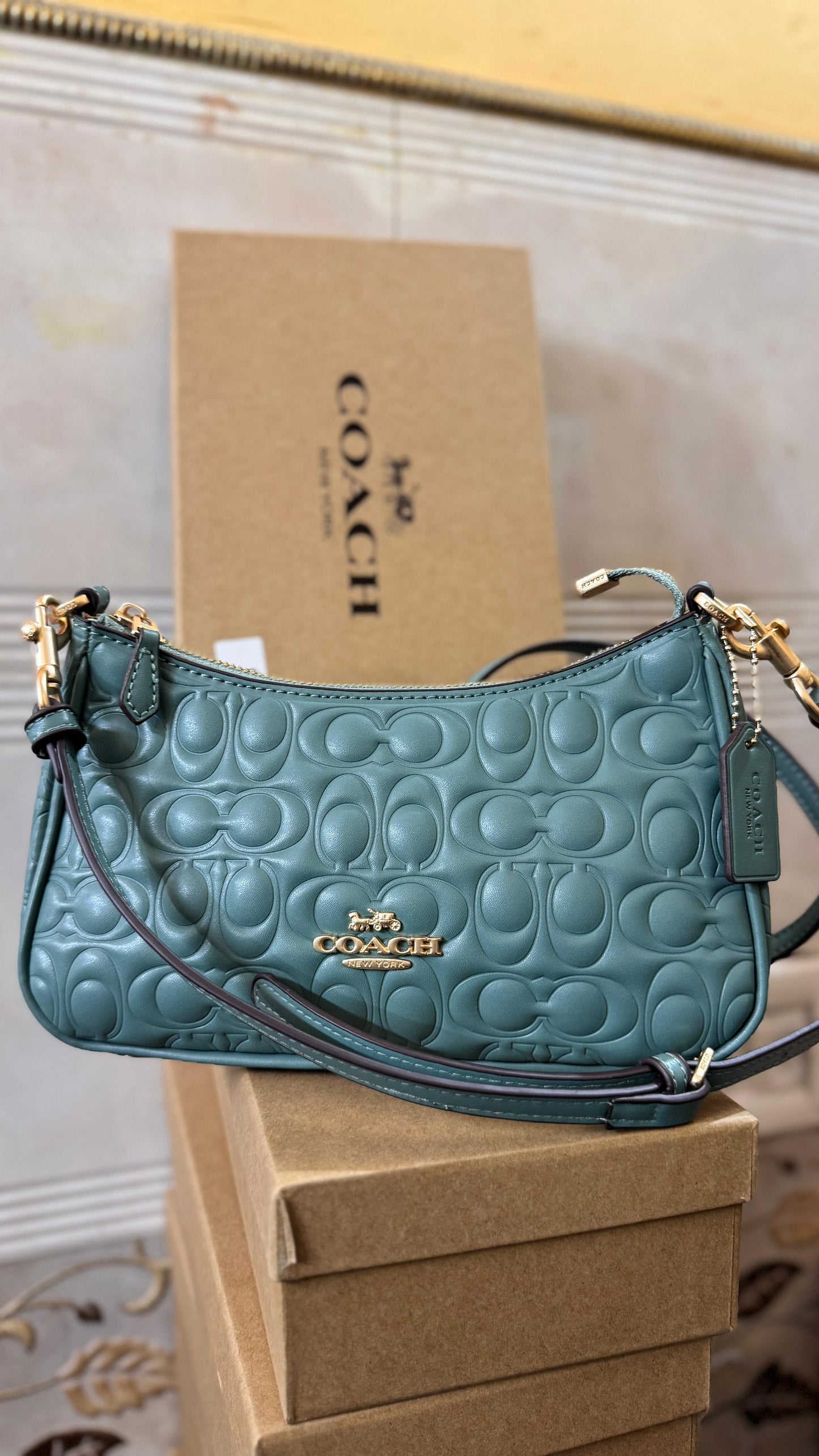 COACH TERRY EMBOSSED