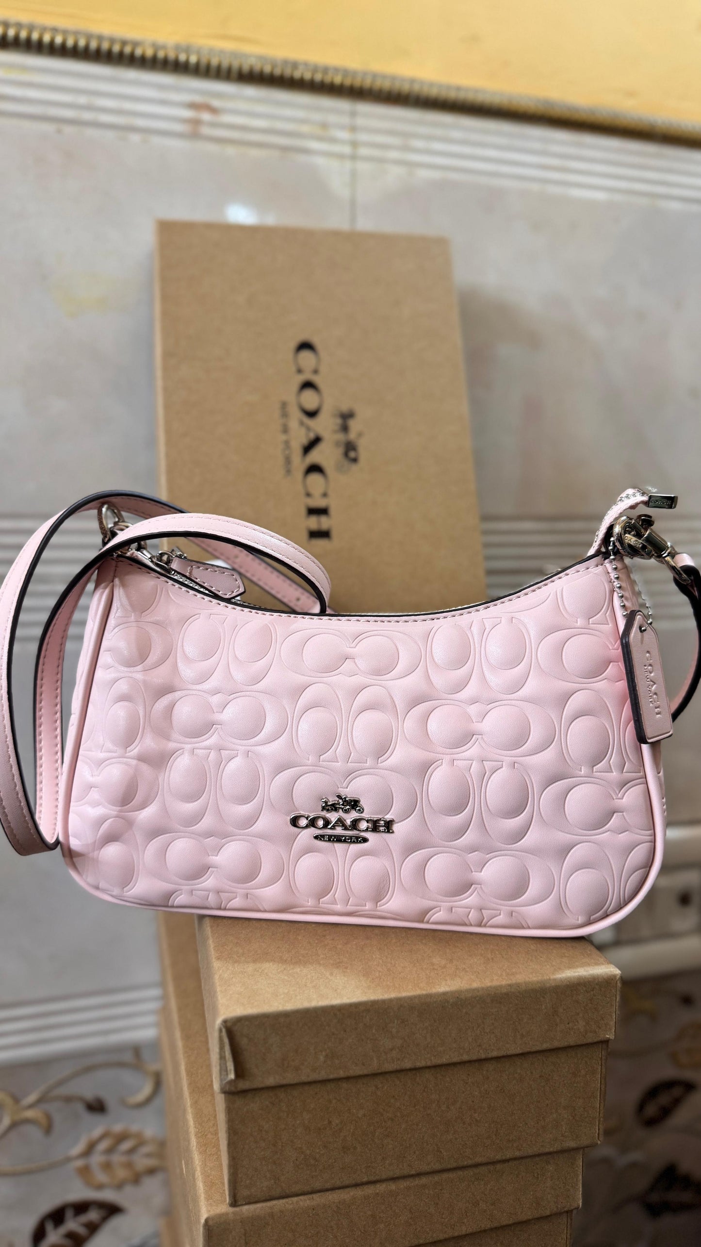 COACH TERRY EMBOSSED