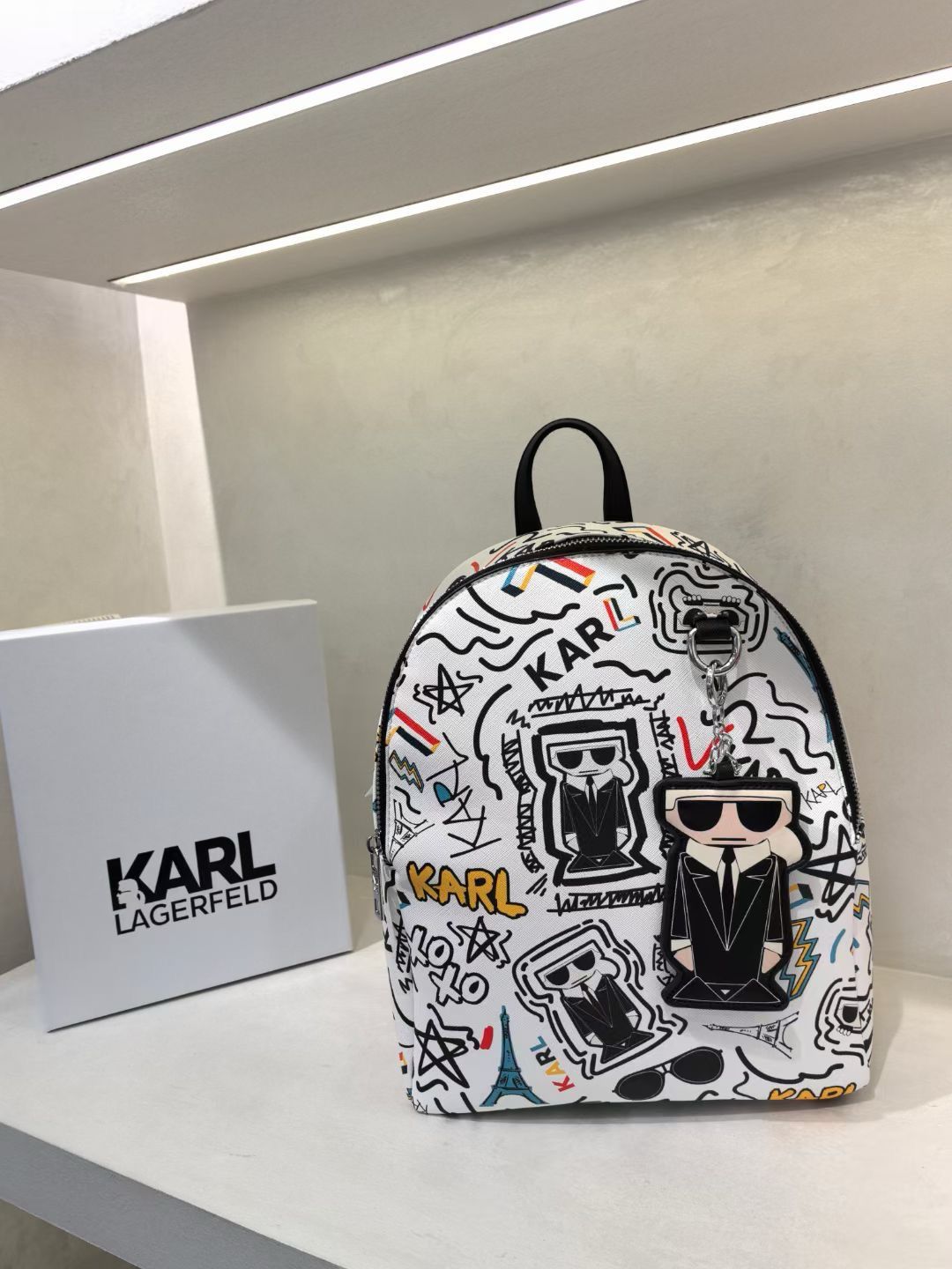 KARL PRINTED TASSLE BACKPACK