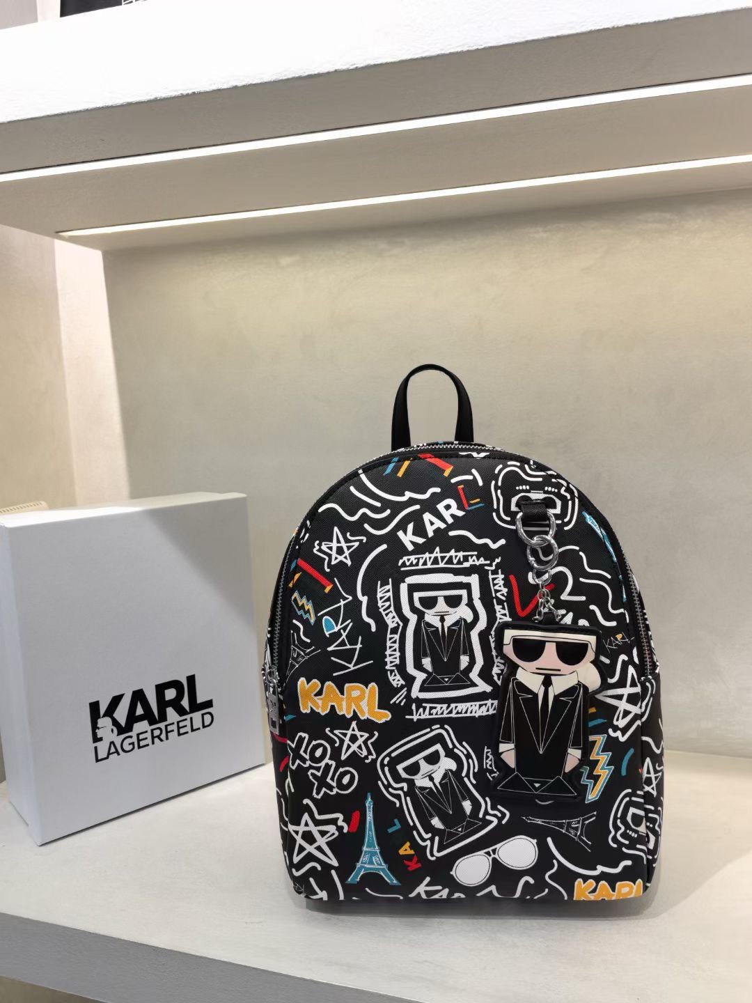 KARL PRINTED TASSLE BACKPACK