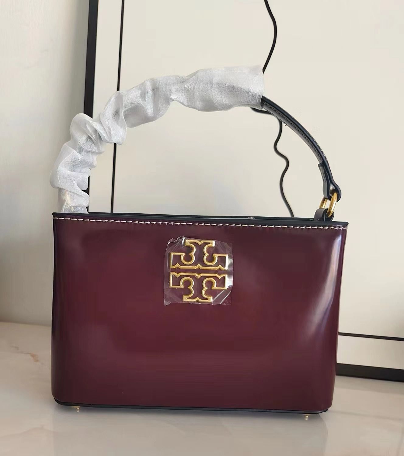 TORY BURCH BRITTEN MATT LEATHER MATERIAL