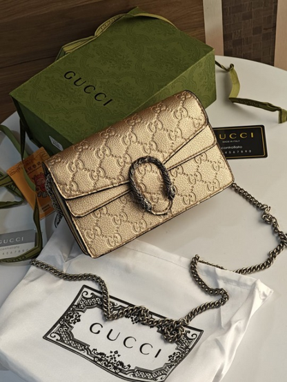 GUCCI GOLD EMBOSSED DIONYSUS