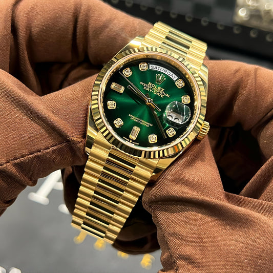 Rolex Day-Date Gold with Green dial giving an elite design