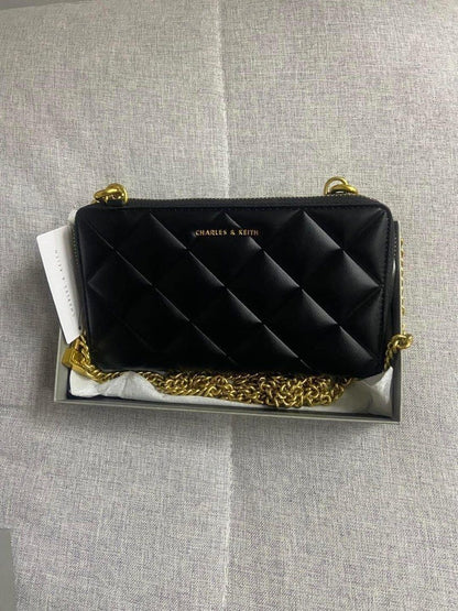 CHARLES & KEITH SWING QUILTED AND PRINTED SLING WALLET