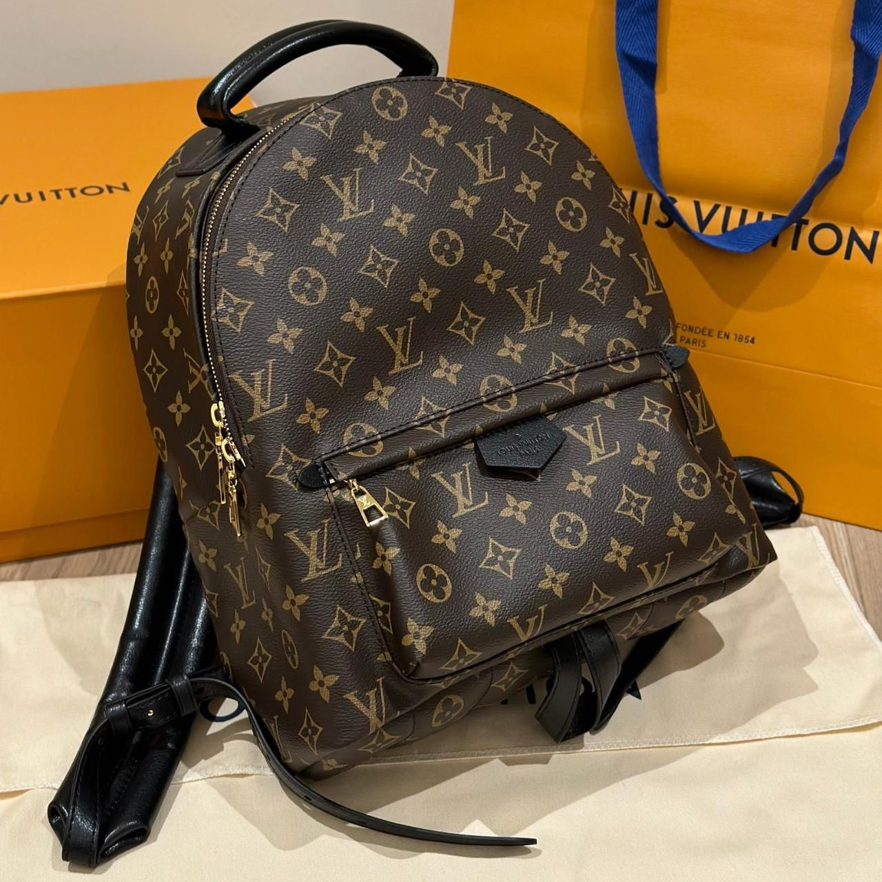 LOUIS VUITTON UNISEX BACKPACKS  IN MONOGRAM PRINT