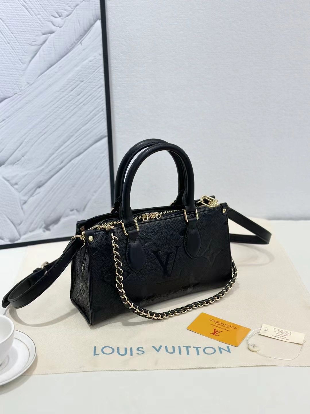 LOUIS ON THE GO EAST WEST POCHETTE BAG