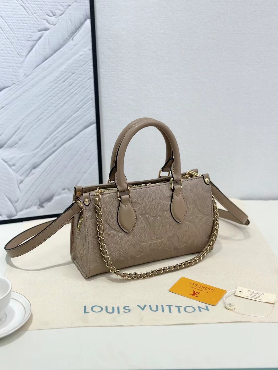 LOUIS ON THE GO EAST WEST POCHETTE BAG