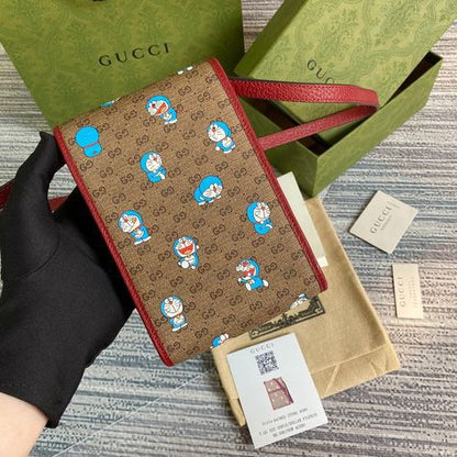 GUCCI DOREMON MOBILE SLINGS