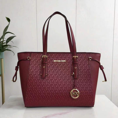 MICHEAL KORS EMBOSSED EAST WEST TOTE