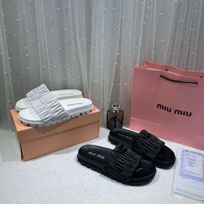 Miu Miu Matelasse Slides For Woman