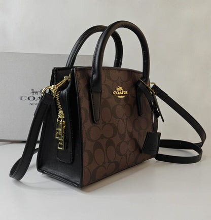 COACH ANDREA CARRYALL