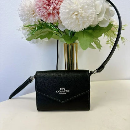 Coach Envelop Wallet Sling