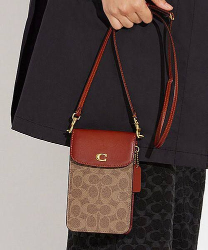 Coach Pebble Leather Mobile Sling Bag