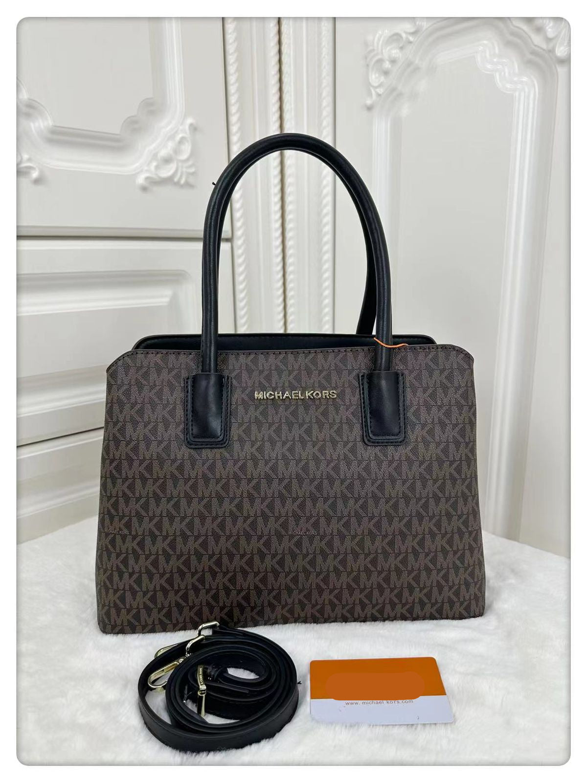 M K-O-R-S BOSTON HANDBAG WITH MULTIPLE POCKETS