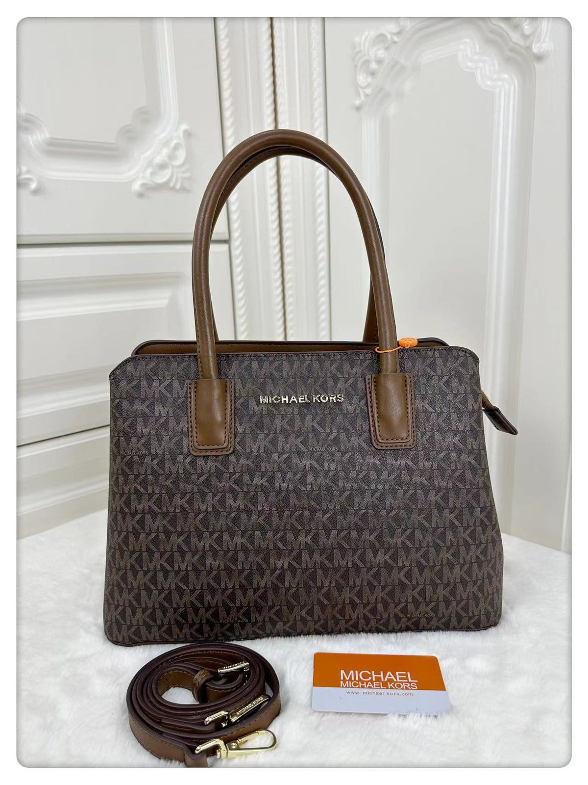 M K-O-R-S BOSTON HANDBAG WITH MULTIPLE POCKETS