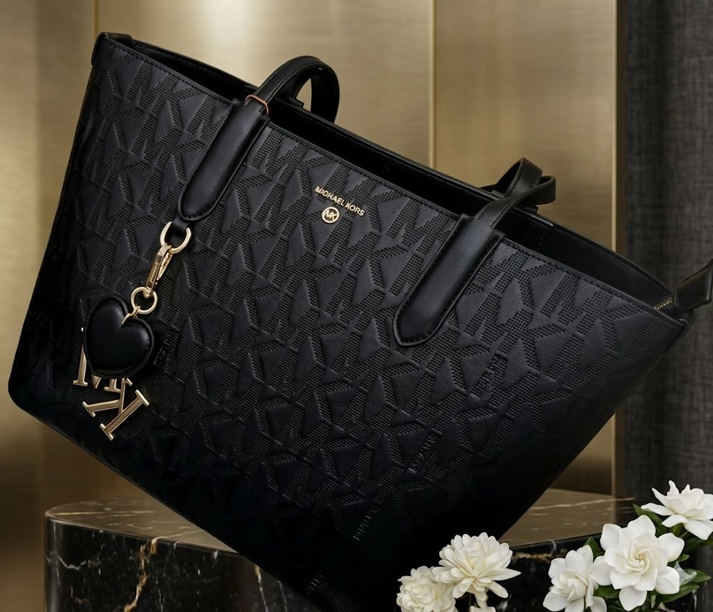 M K-O-R-S CITY TOTE WITH TASSLE