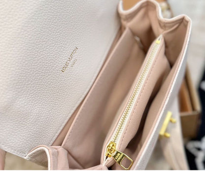 LOU-IS VU-IT-TON EAST WEST METIS POCHETTE