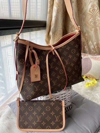 Louis Vuitton Carryall Denim Signature Hobo