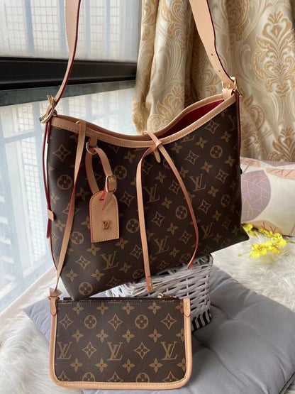 Louis Vuitton Carryall Denim Signature Hobo